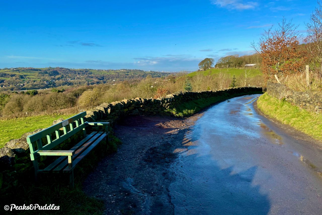 At the junction of two byways, a bench marks the start of the short drop down into Brookbottom itself.